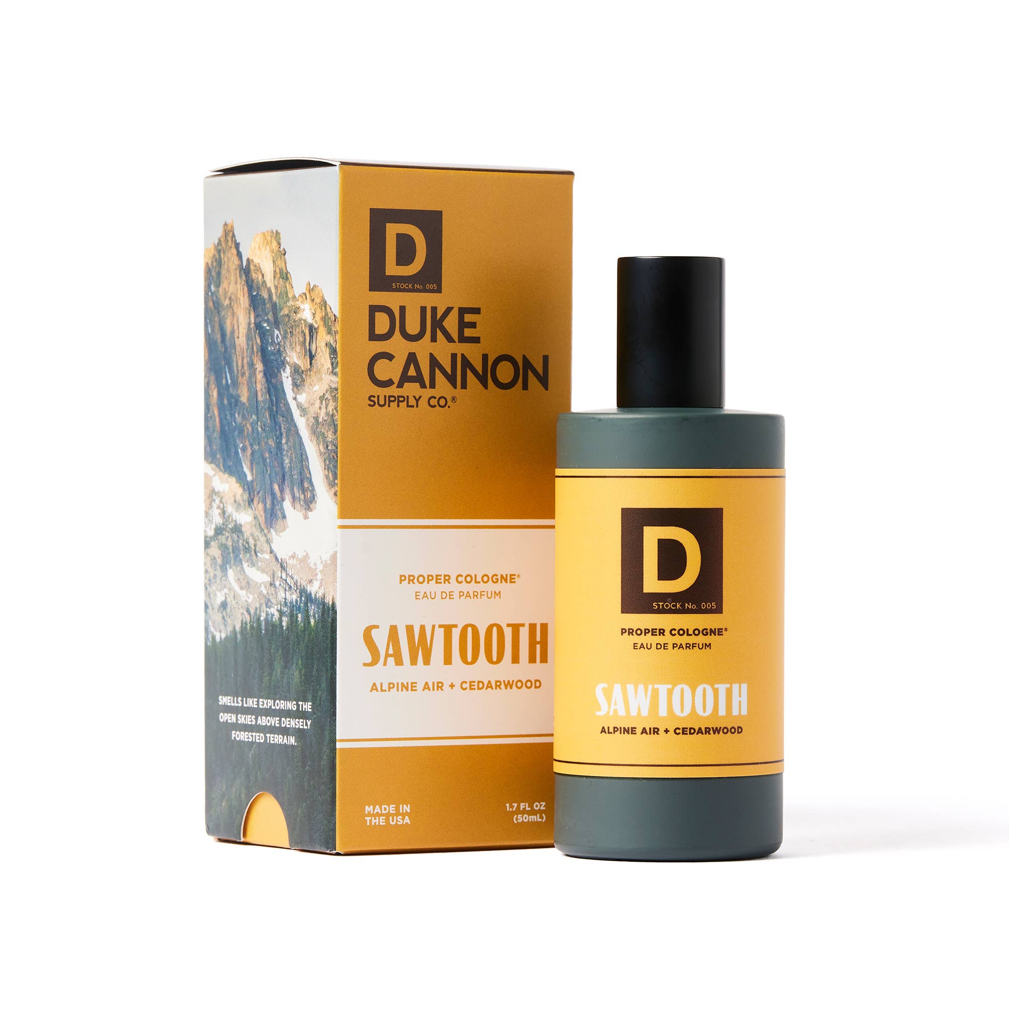 Duke Cannon cologne bottle and packaging with mountain scenery
