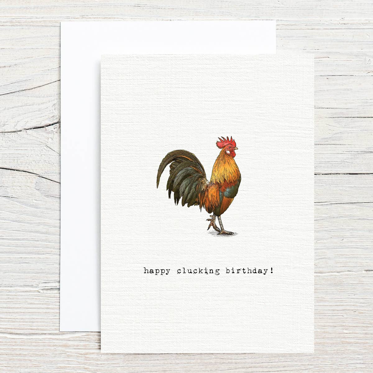 Card with a rooster illustration and 'happy clucking birthday!' text on a white background.