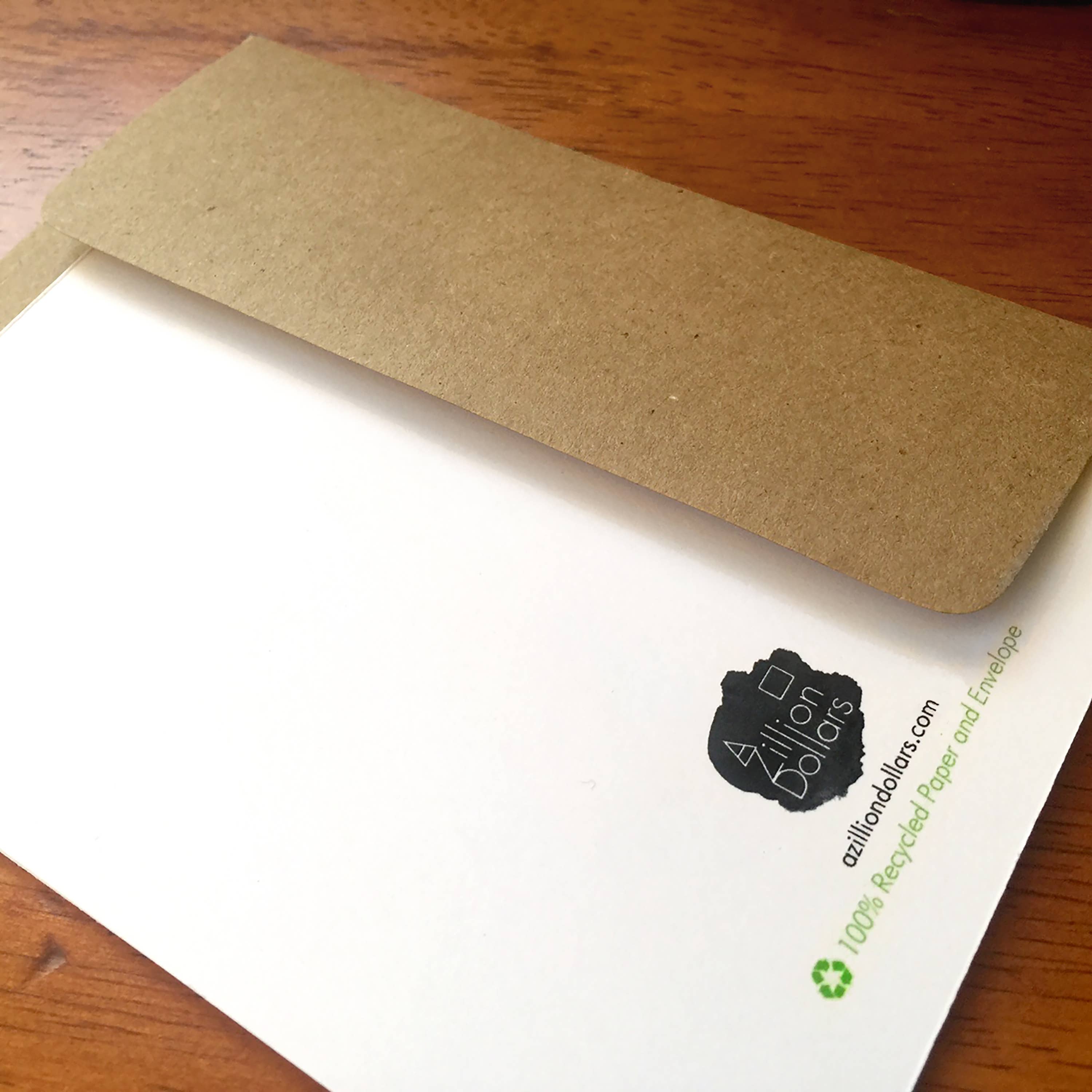 Brown envelope and white paper with 'Allion Dollars' branding on a wooden surface