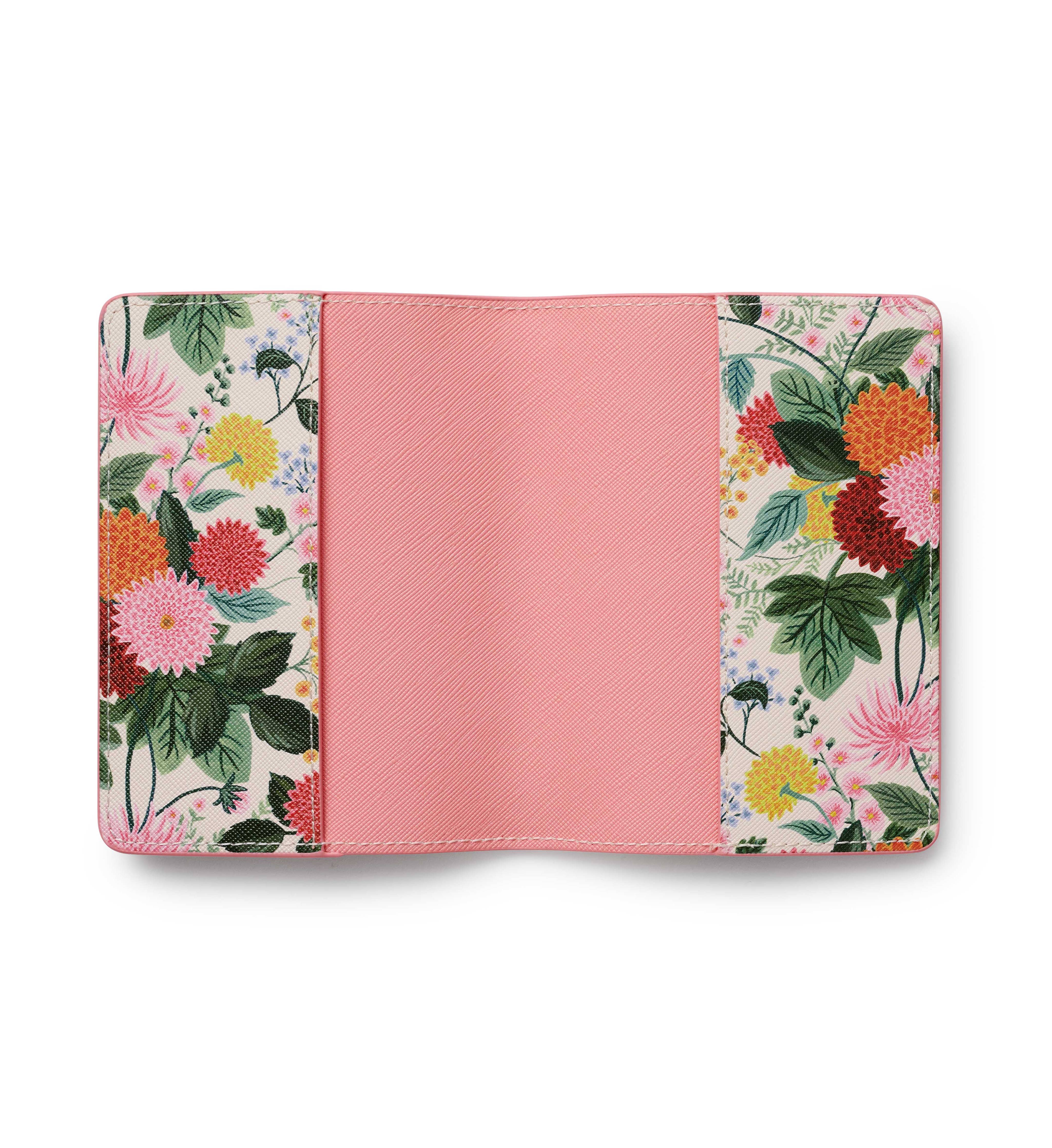Floral-patterned passport holder with pink interior on a white background