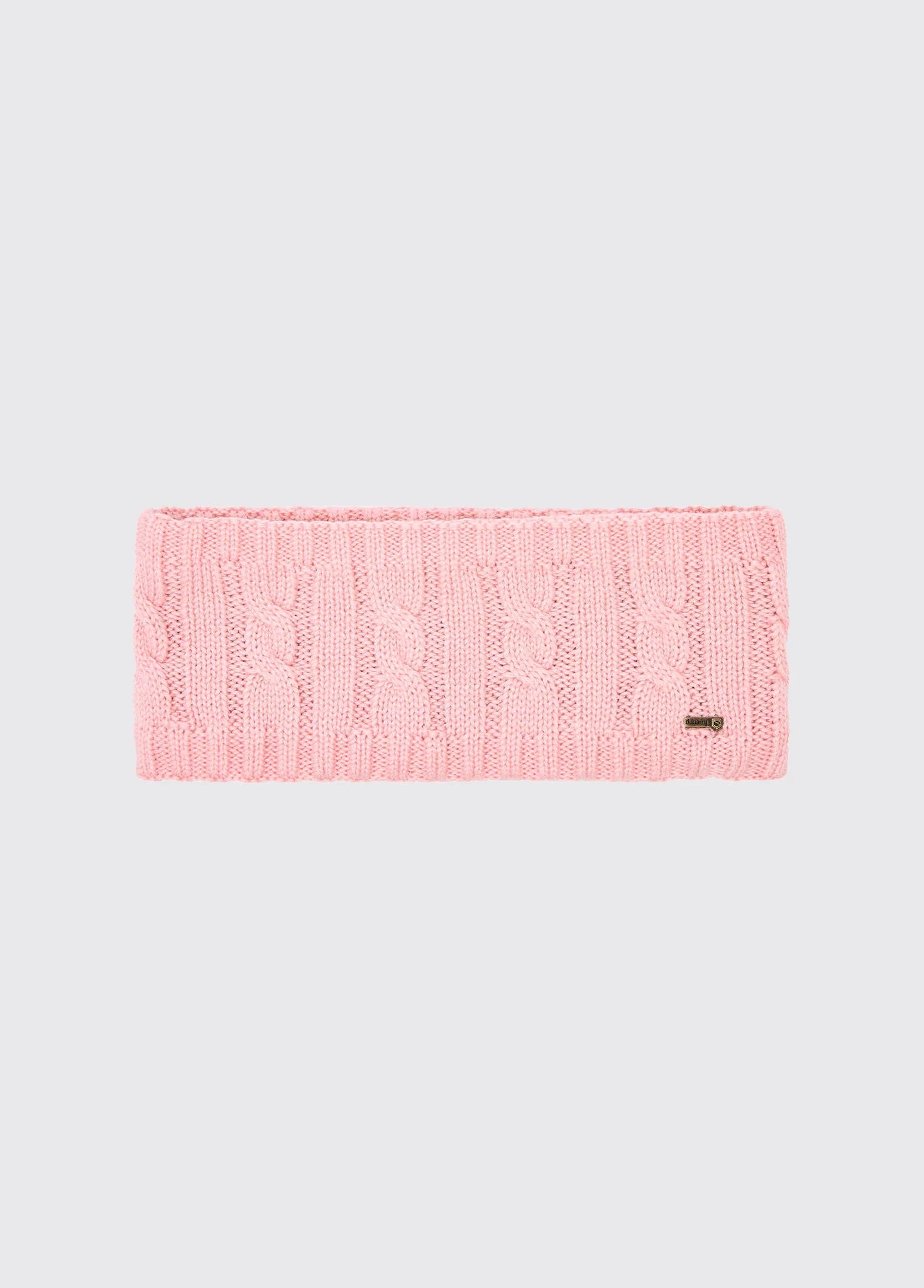 Pink knitted headband on a light gray background