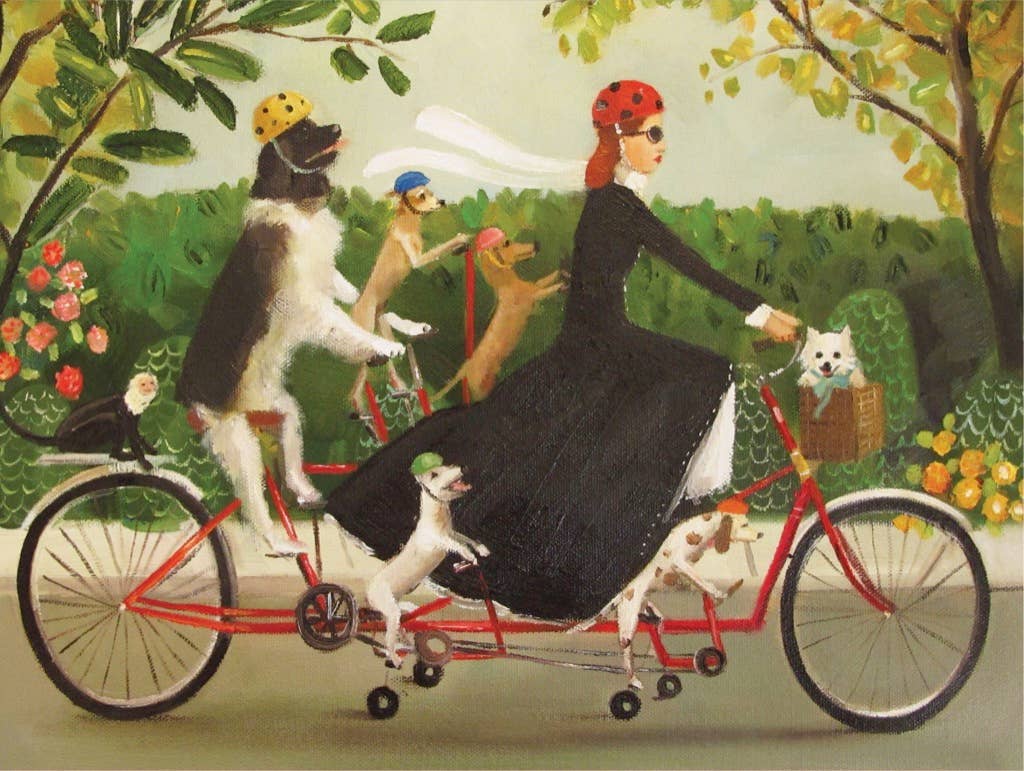 Woman riding a tandem bicycle with dogs in a garden setting