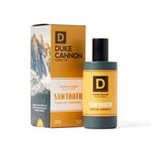 Duke Cannon cologne bottle and packaging with mountain scenery