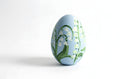 Decorative egg with floral design on a white background