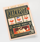 Greeting card with slot machine design and text 'I hit the jackpots with you!' on a light gray background