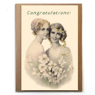 Vintage-style card with two women holding flowers and 'Congratulations!' text.