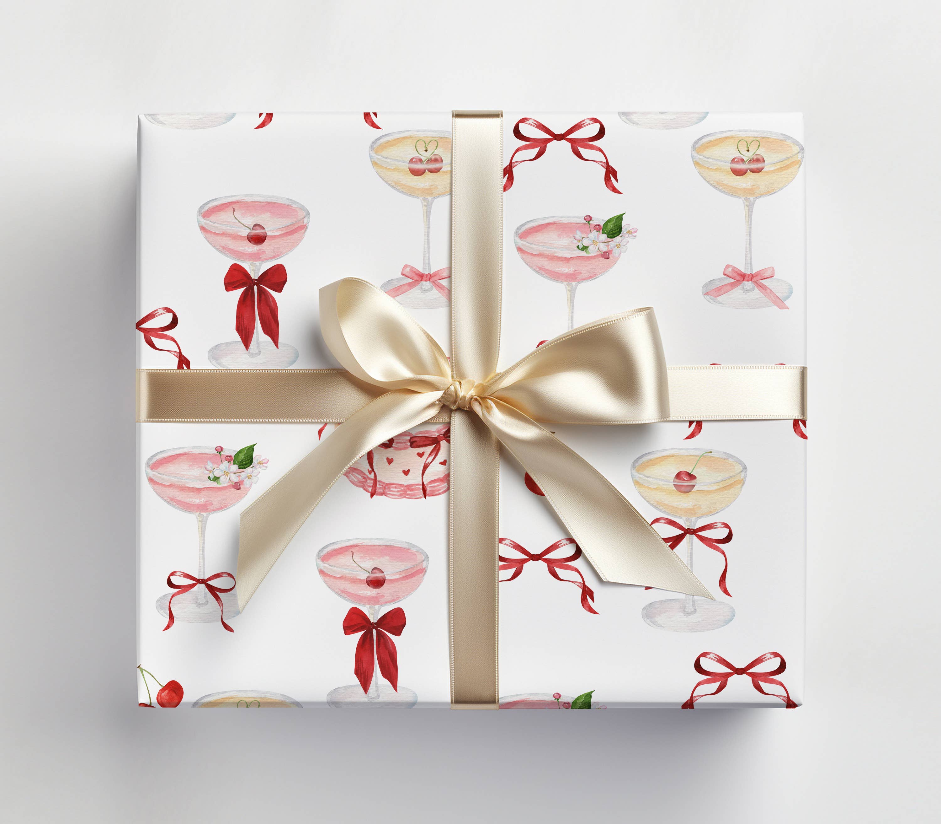 Gift box with decorative pattern and ribbon on a light gray background