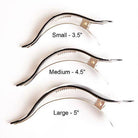 Three pairs of hair clips with size labels on a white background
