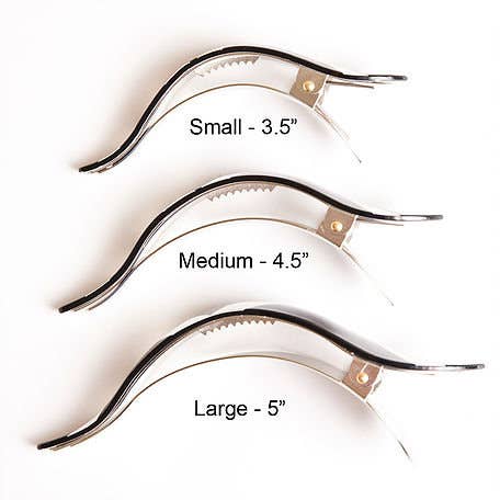 Three pairs of hair clips with size labels on a white background