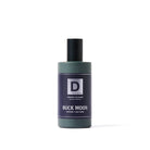 Bottle of Buck Moon cologne on a white background