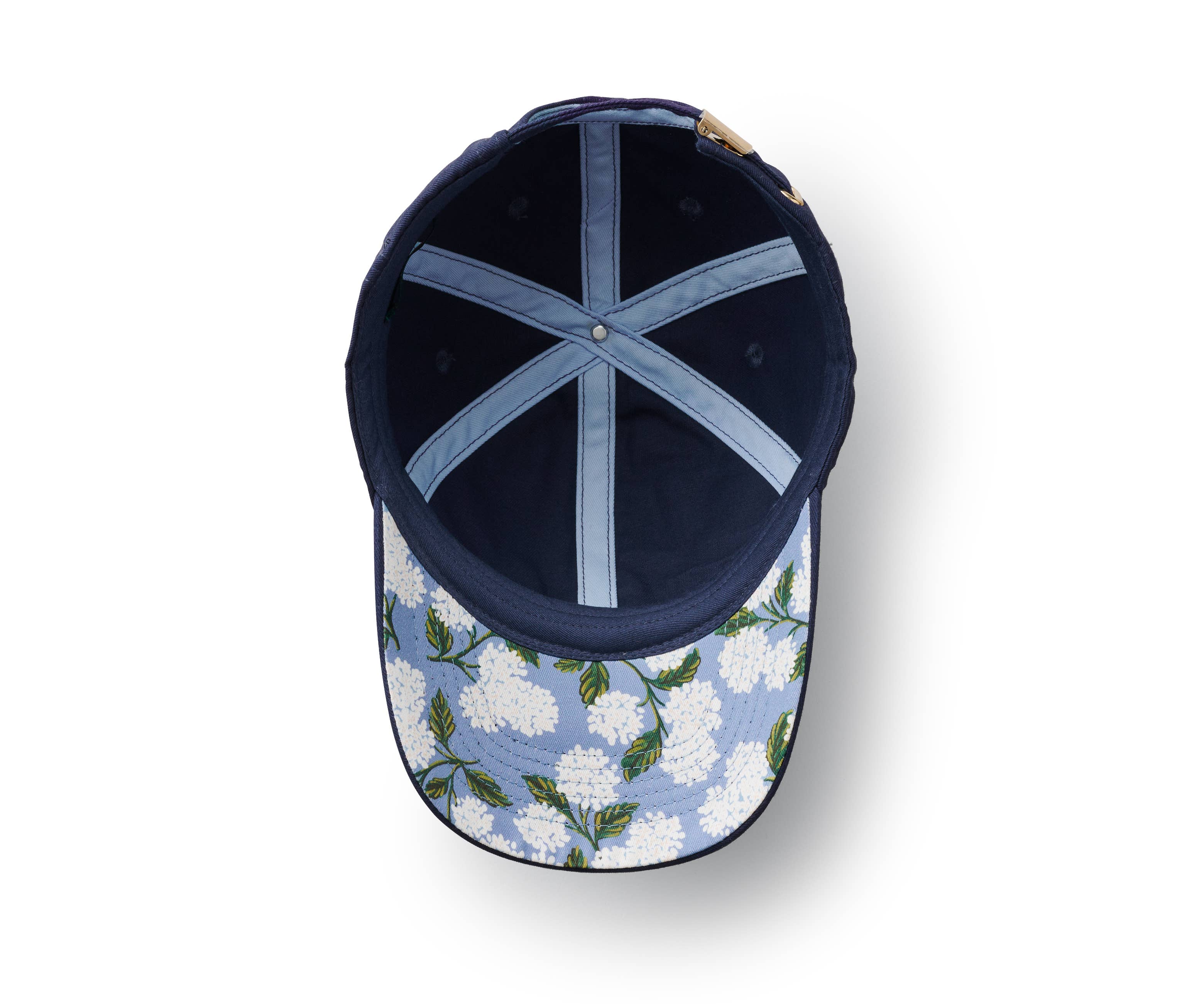 Navy blue cap with floral pattern on a white background