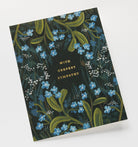 Greeting card with floral design and 'With Deepest Sympathy' text on a white background
