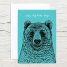 Poster with a bear illustration and 'Big, big bear hugs' text on a teal background
