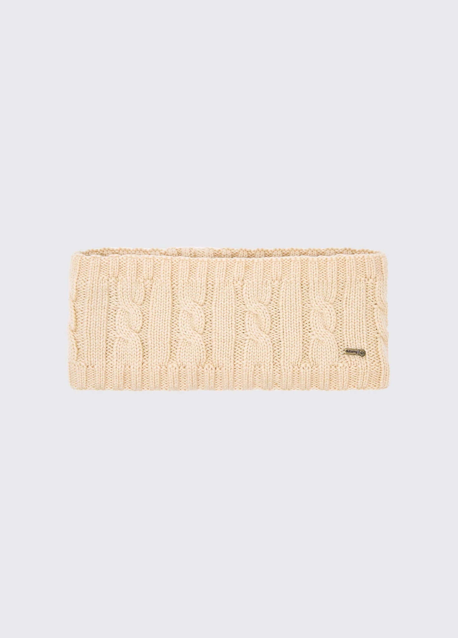 Beige knitted headband on a light gray background